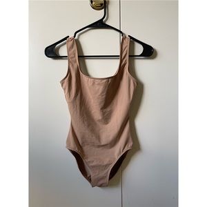 Danskin Platinum flesh-toned scoop neck tank leotard